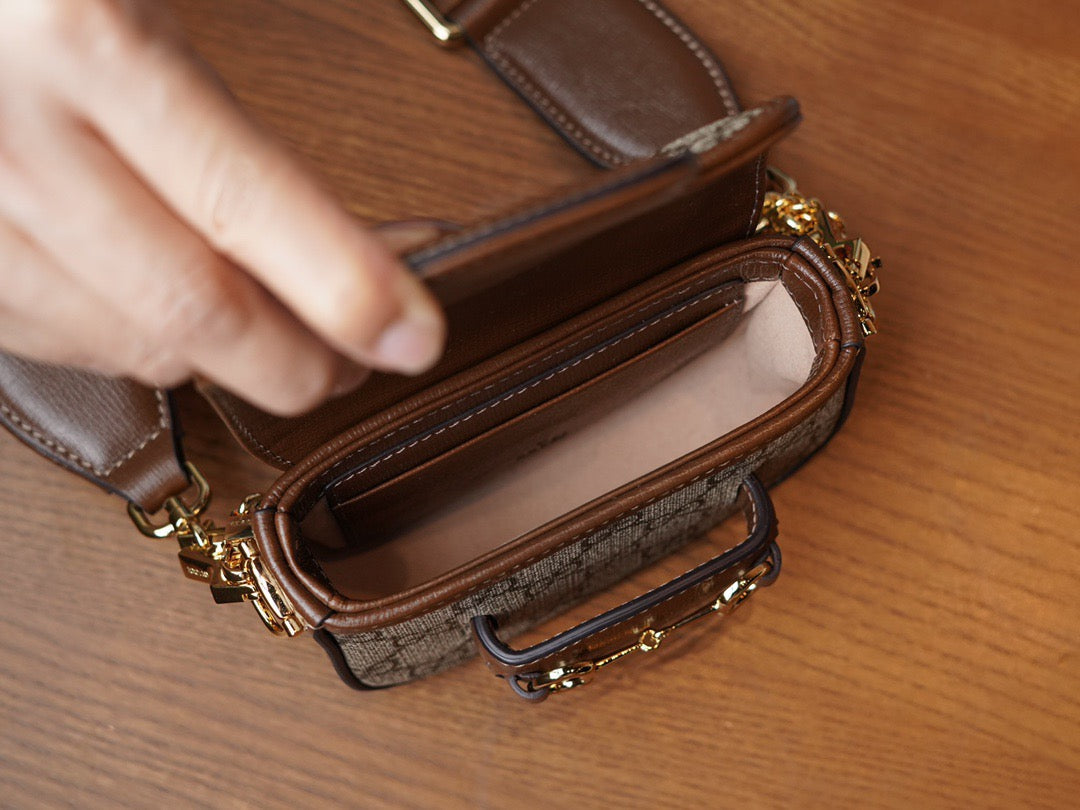 Horsebit 1955 Mini leather-trimmed shoulder bag