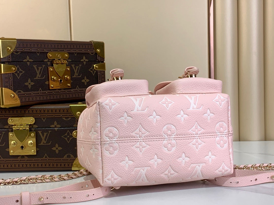 Backup Monogram Empreinte Leather Handbags