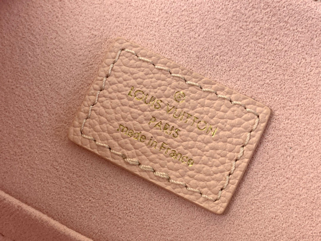 Backup Monogram Empreinte Leather Handbags