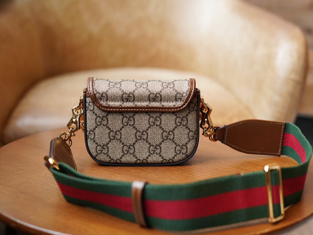 Horsebit 1955 Mini leather-trimmed shoulder bag