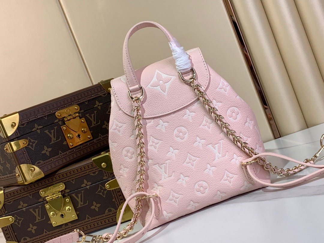 Backup Monogram Empreinte Leather Handbags